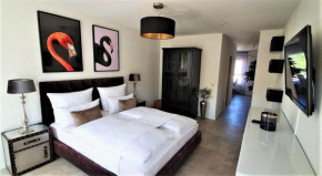 Deluxe-Apartment-Flamingo-in-Paradise
